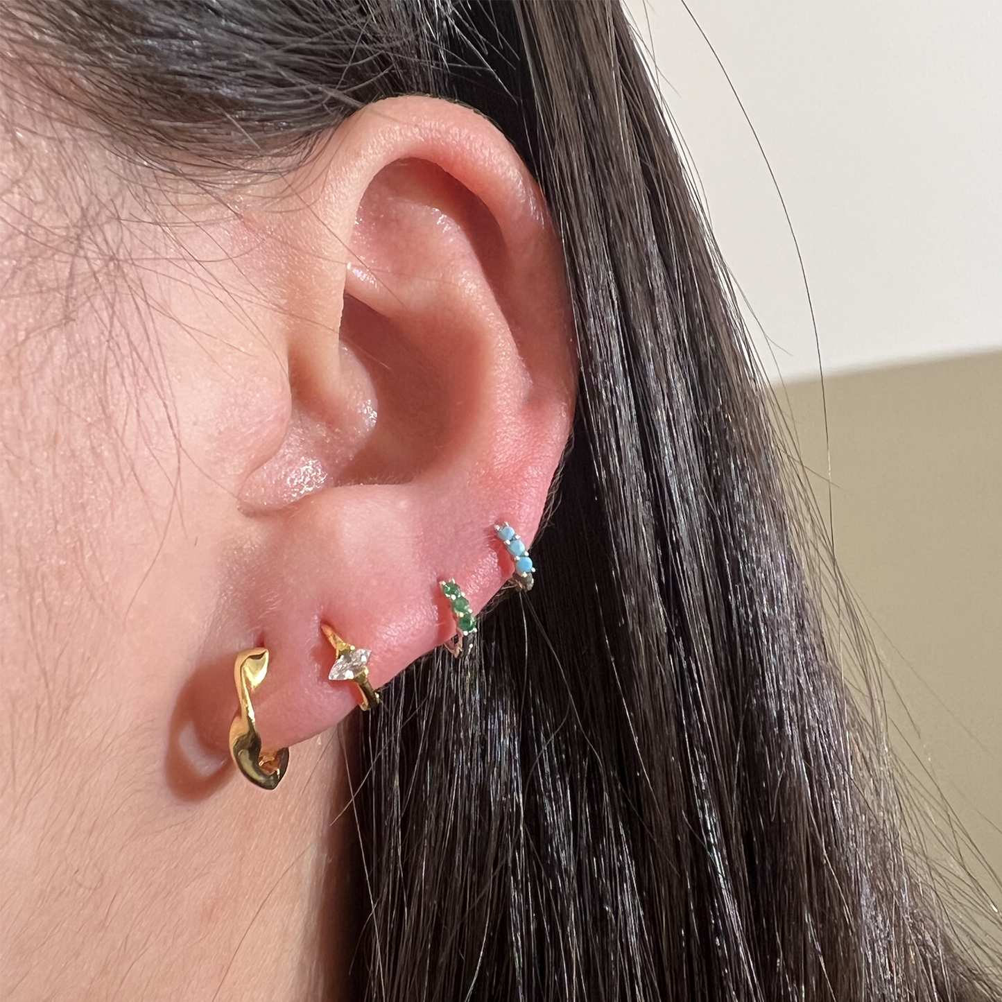 Triple gemstone huggie earring-1