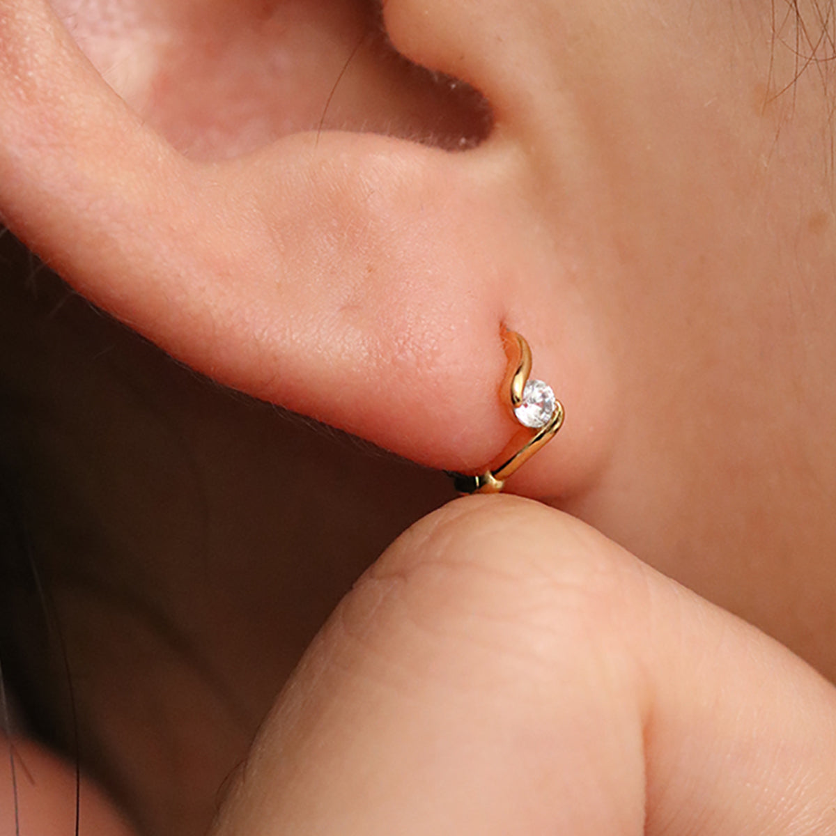 Cubic Twist Huggie Earrings-1